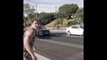 Crazy guy saves cat by jumping in the middle of the street! #Trick or skill