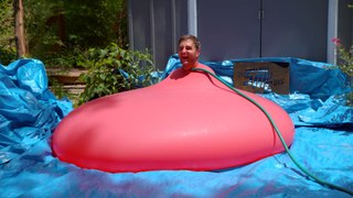 6ft Man in 6ft Giant Water Balloon - 4K - The Slow Mo Guys (2160p)