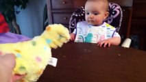 Baby's shocked reaction to an Easter hen laying eggs - -Wanna see it again--