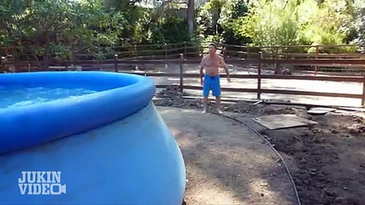 Dad Embarrasses Himself Jumping Into Pool