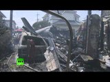 Plane crashes into homes in Tokyo killing 3 people