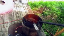 Pouring molten aluminum into a pool