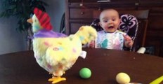 Baby Freaks Out When She Sees An Easter Hen Laying Eggs