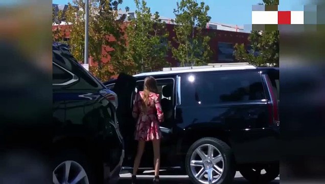 British Model Cara Delevingne gives a cheeky dance to car friend