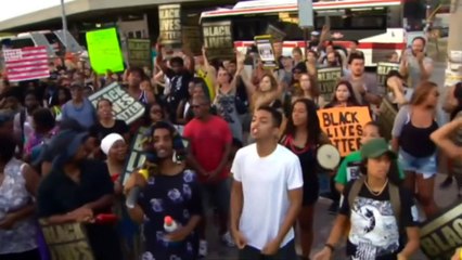Protestors march in Toronto after police kill two black men