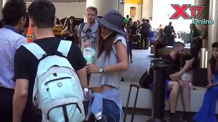 Alessandra Ambrosio Makes Eating Popcorn Look Sexy At LAX