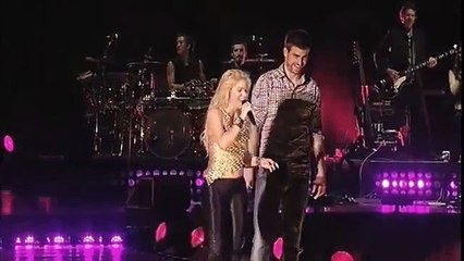 Barcelona players on stage with Shakira (Suerte)