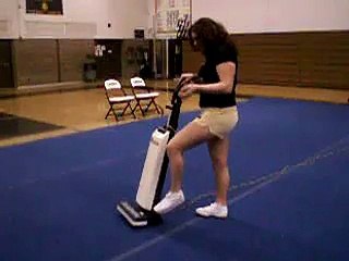alex vacuuming the cheer mats