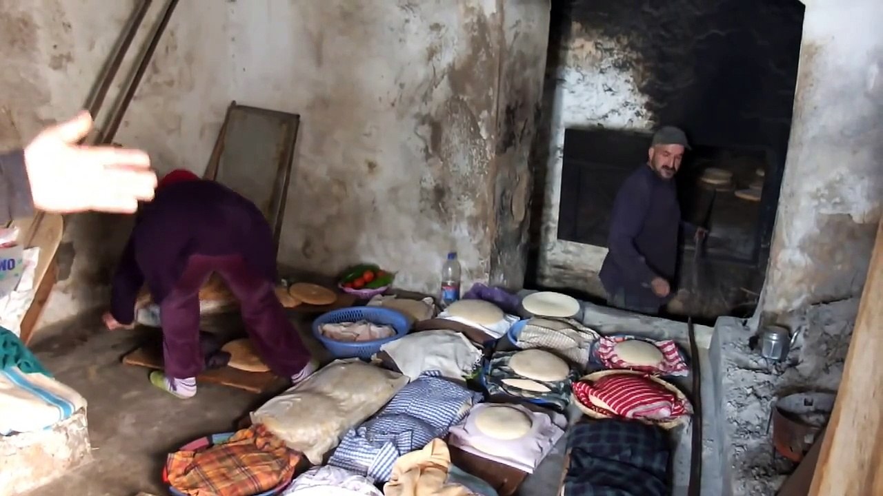 Traditional way of cooking bread In Bhalil 3 km close to Sefrou & 24 km to Fez Morocco