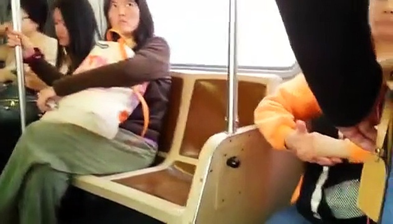 Chinese Woman Fights with Crazy Bum on the Muni Bus