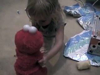 Skylar plays with Elmo TMX