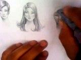 o meu professor esta desenhando os rostos do modelo. para que a gente possa aprender a desenhar bem
