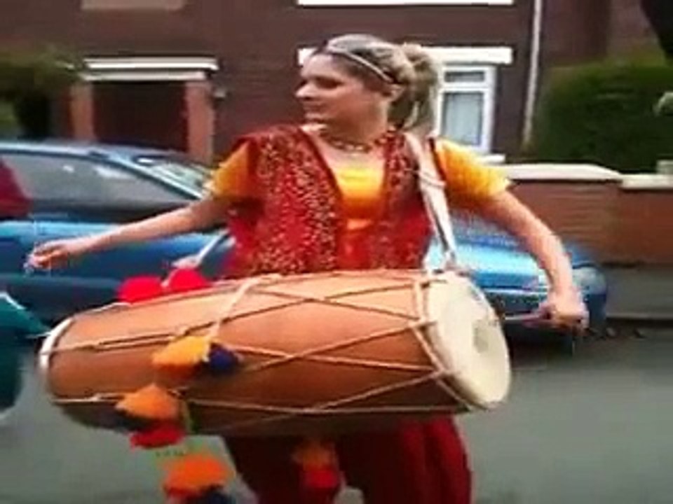 Pakistani Girl Playing with Dhol In UK.  must see and comments Please.flv