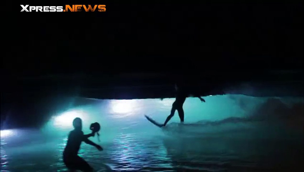 Session de surf de nuit au Wavegarden
