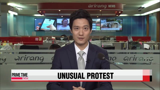 Activists demonstrate from Portland bridge against Shell