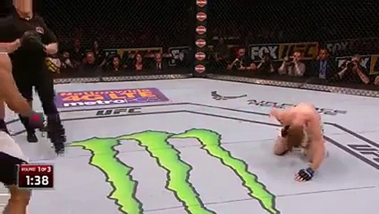 Barbozas kick lands below the belt Felder drops to his knees