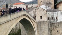 Man Jumping From The Old Bridge of Mostar in Bosnia 2015