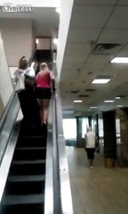 Lady Who's High on Drugs Doesn't Realise She's Going in The Wrong Direction On the Escalator