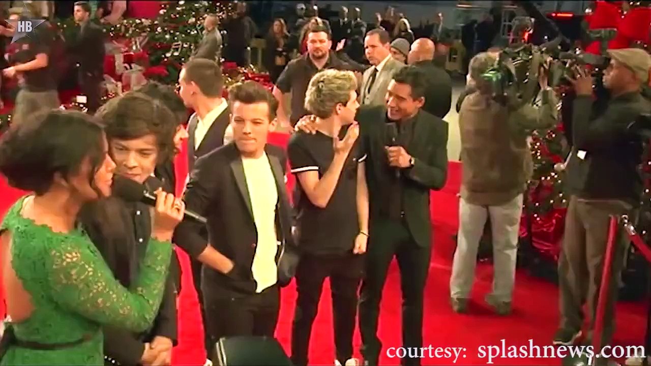 Louis Tomlinson Rips Liam Payne's Shirt Open During Concert