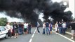 French ferry workers burn tyres to block Calais port