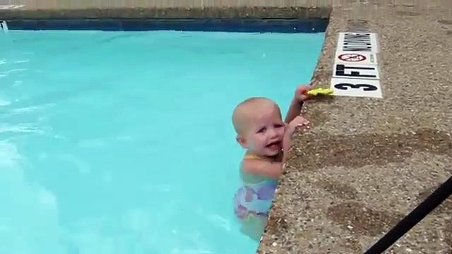 Baby Swims Across Pool