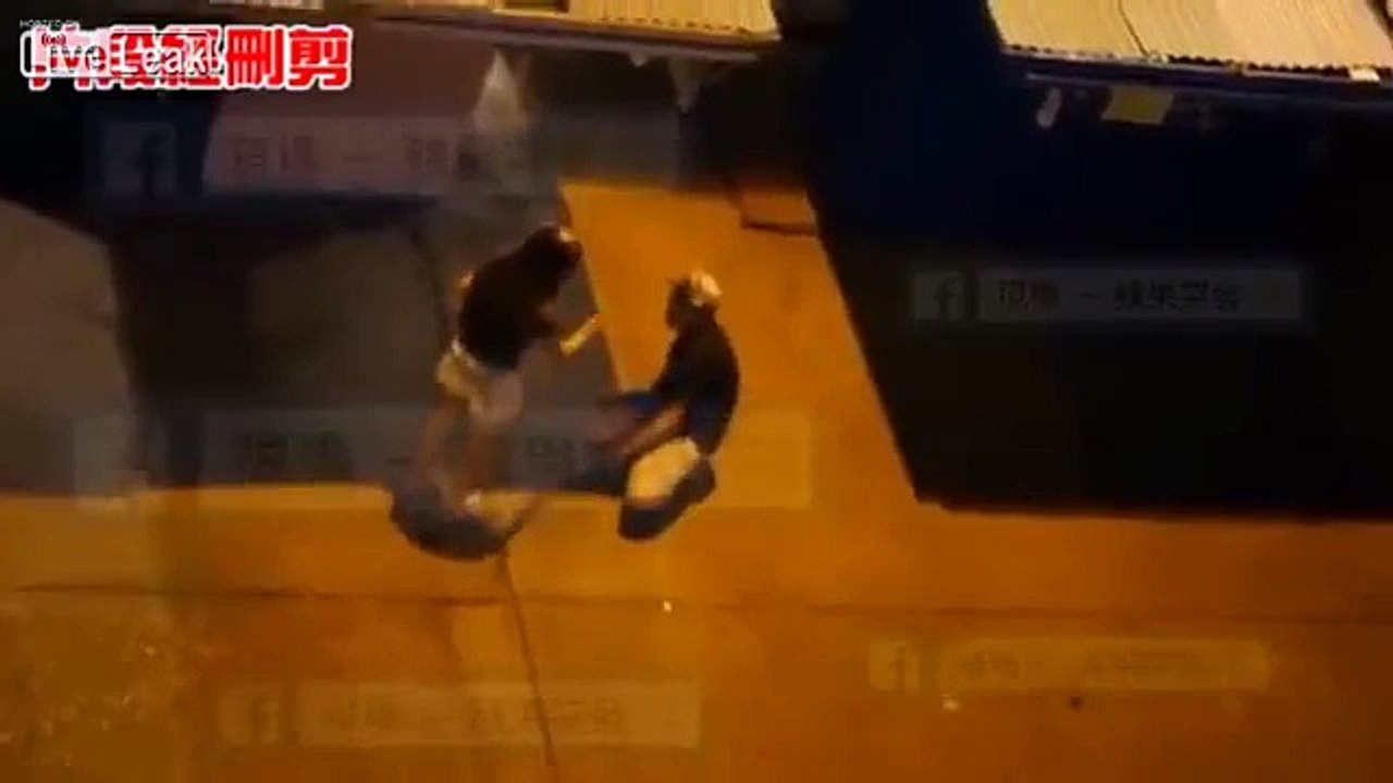 HongKong girl kicking and beating a man begging for mercy