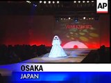 The Japanese unveil a robot by having the humanoid creation model a wedding dress