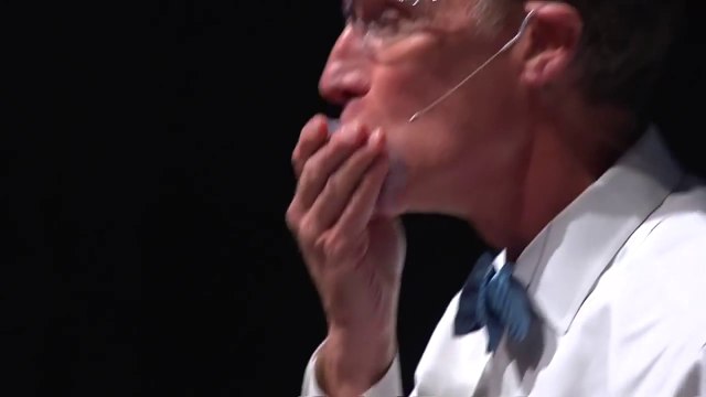 Scientist having fun experiments with liquid nitrogen and eating it!