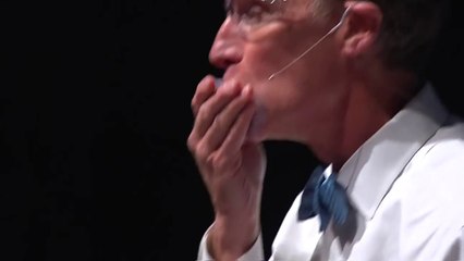 Scientist having fun experiments with liquid nitrogen and eating it!
