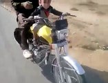 A TWO YEAR CHILD DRIVING THE BIKE