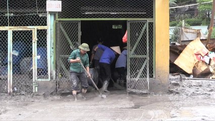 Vietnam hit by flooding, toxic sludge from coal plants
