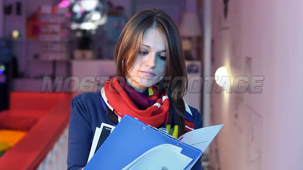 Young woman office worker writing papers, businesswoman in cafe. Stock Footage