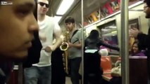 Two Total Strangers Have Saxophone Battle On NYC Subway Train