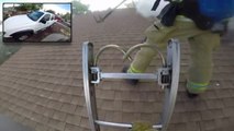 Intense POV of firefighter opening house on fire by the roof
