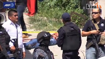 Komader polis dihujani lebih 100 peluru terbunuh