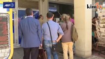 Greece: Banks remain closed, ATMs run out of cash