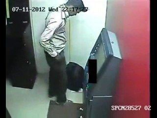 Watch the talent of pakistani thief taking out money from ATM