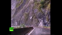 RAW: Moment massive landslide blocks Chinese highway