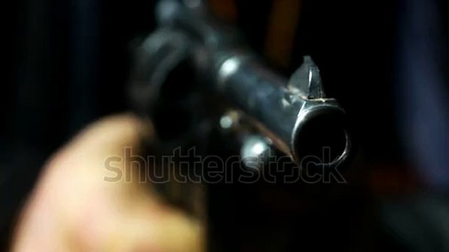 Revolver Shoots - Macro Lens And Slow Motion For 2.5 Times. Stock Footage Video 1488241 - Shutterstock