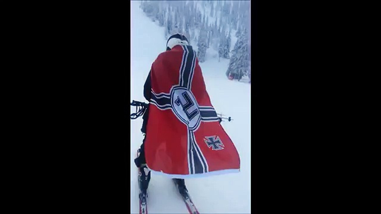 Ben Garrison - Evil Bigot skiing down a kiddie slope wearing a nazi flag