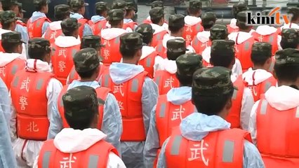 China: salvage and rescue personnel remember victims