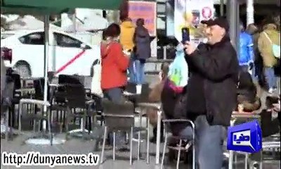 Cristiano Ronaldo pranks around on road with pedestrians .  :)