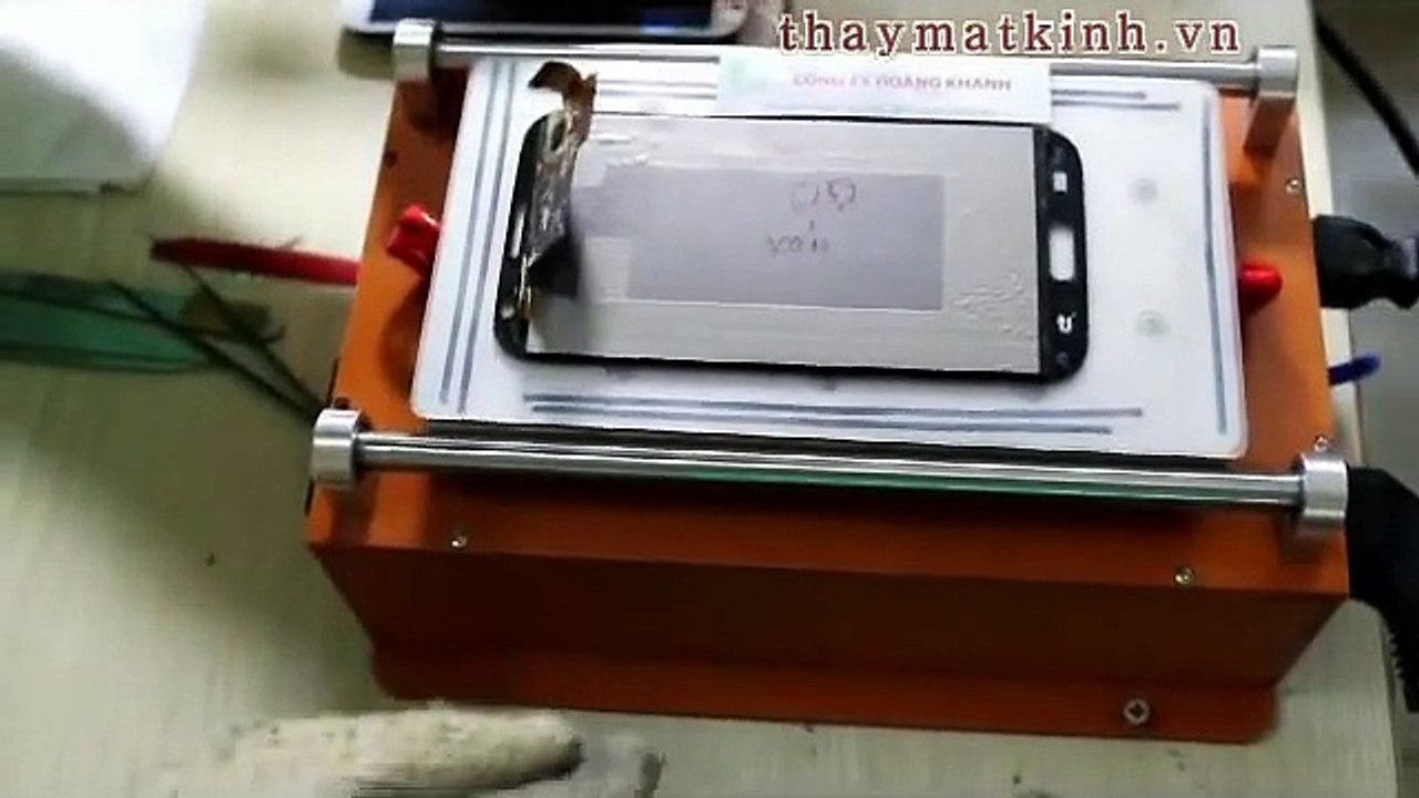 Bộ máy ép kính chân không