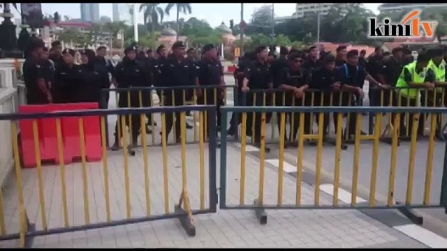 Police stand guard at Dataran Merdeka