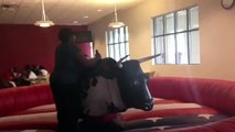 Dr. Finch rides the mechanical bull
