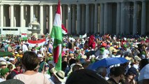 Altar servers gather in Saint Peter's Square to greet Pope