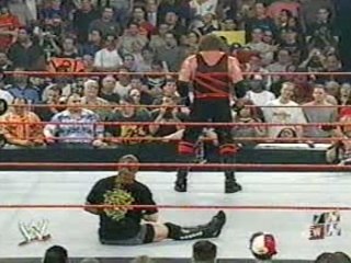 KANE UNMASKS ON RAW