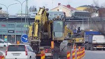 Heavy haulage Scania 143 500 8x4 with a Komatsu PC600 LC on the Lowboy Big Load