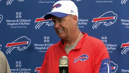 Rex Ryan eats dog biscuit for charity