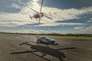 Aerobatic Helicopter Chases Drifting Race Car